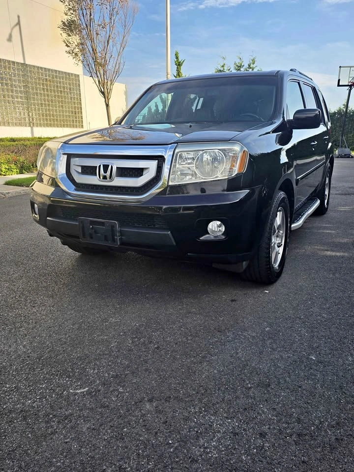 2011 Honda Pilot · EX-L w/Navigation Sport Utility 4D