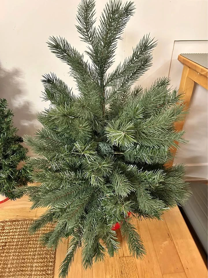 Very realistic looking 32“ Artificial Christmas Tree with Red Ba