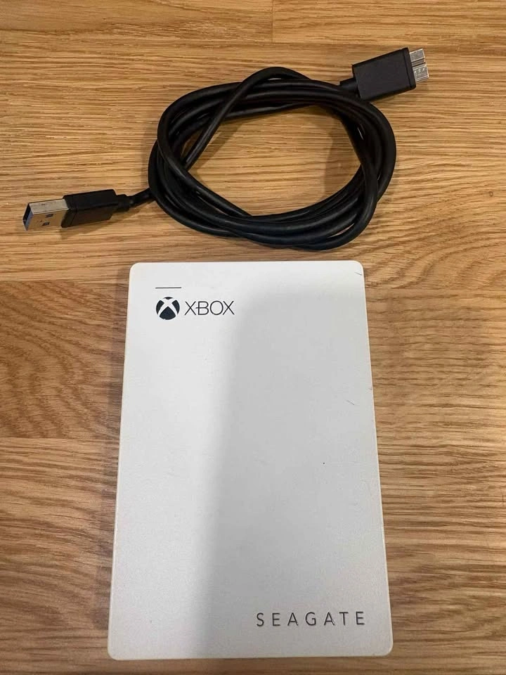 XBOX Series X 1TB with 2TB HDD, 7 Controllers, and 12 Games - photo 4