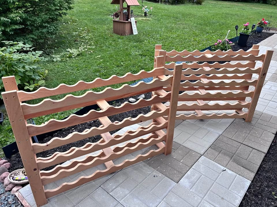 Two solid natural wood wine racks