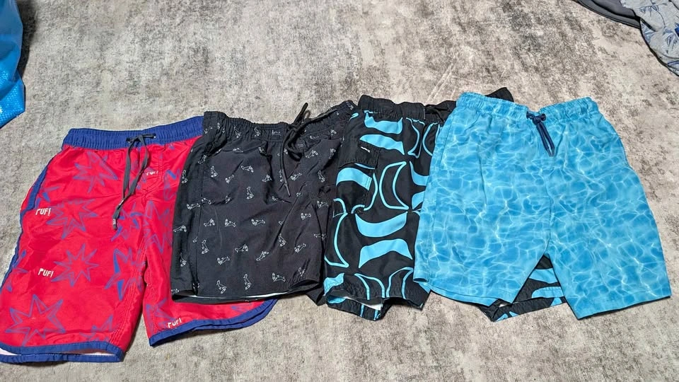 4 swimming shorts 8T EUC