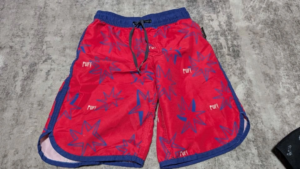 4 swimming shorts 8T EUC - photo 5