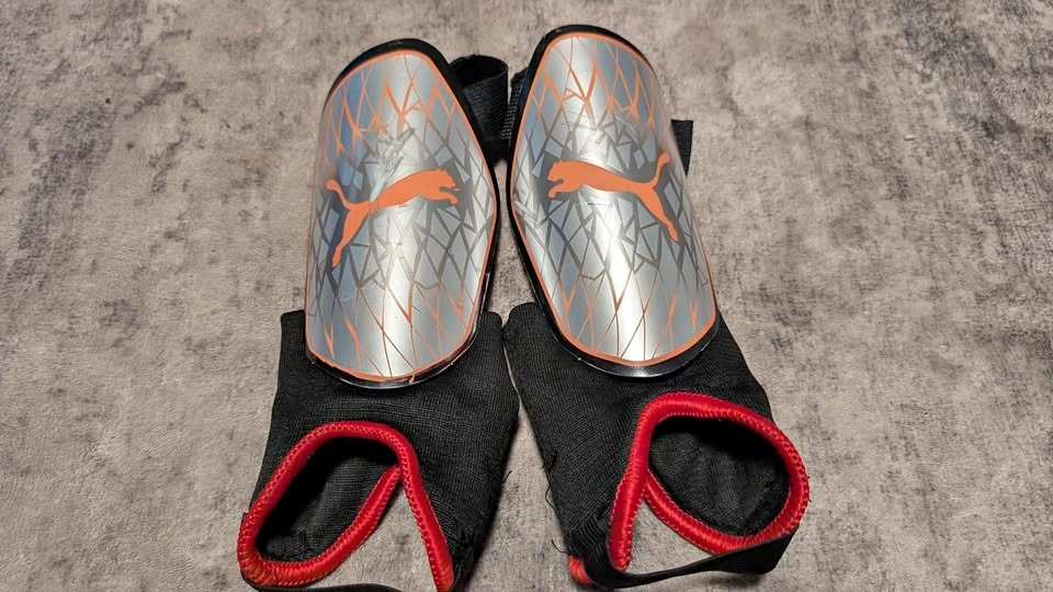 Puma soccer shin pads size small