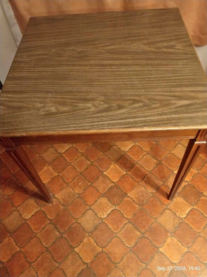 Mid-century modern table 32x32. Wood with laminate top.