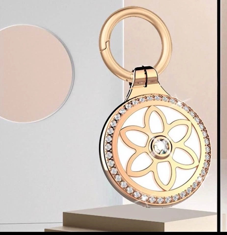 Gold rhinestone floral AirTag case keychain