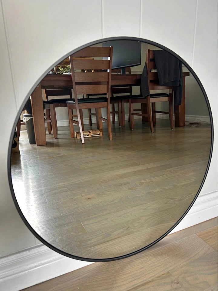 24” black mirror with metal frame