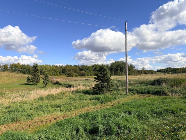 3.28 Acre Lot in Beautiful Neighborhood Across from Pond