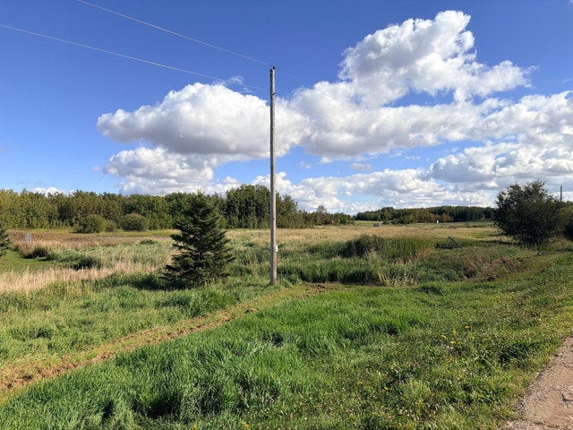 3.28 Acre Lot in Beautiful Neighborhood Across from Pond - photo 3