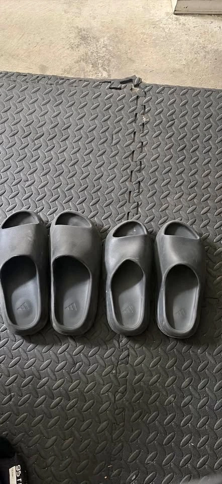2 pairs of Yeezy slides