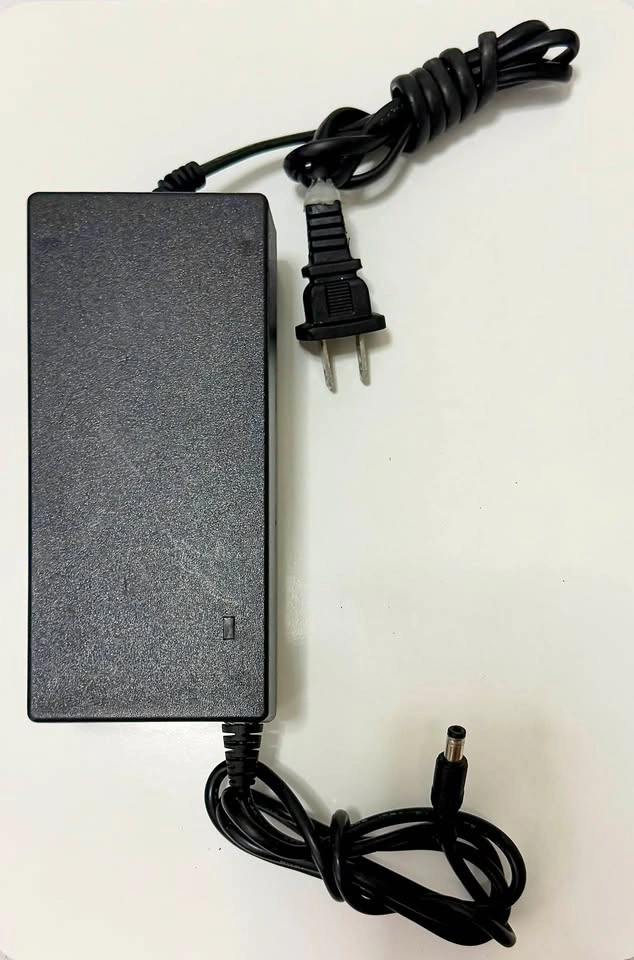 Power Adapter AC/DC Output: 54.6 V - 2.0 A Model: HLT - photo 2