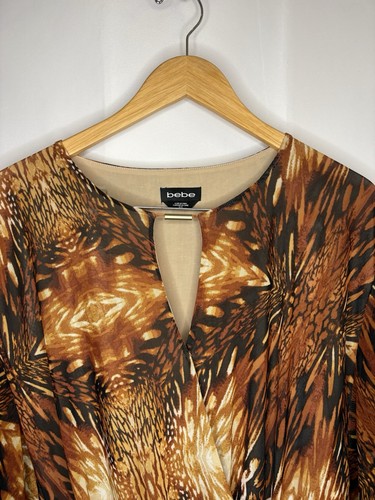 Bebe Women’s Y2K Animal Print Blouse Size Medium - photo 2