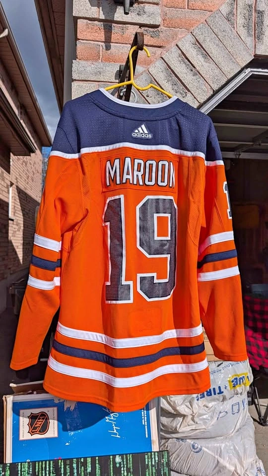 Assorted Hockey Sweaters and Gear