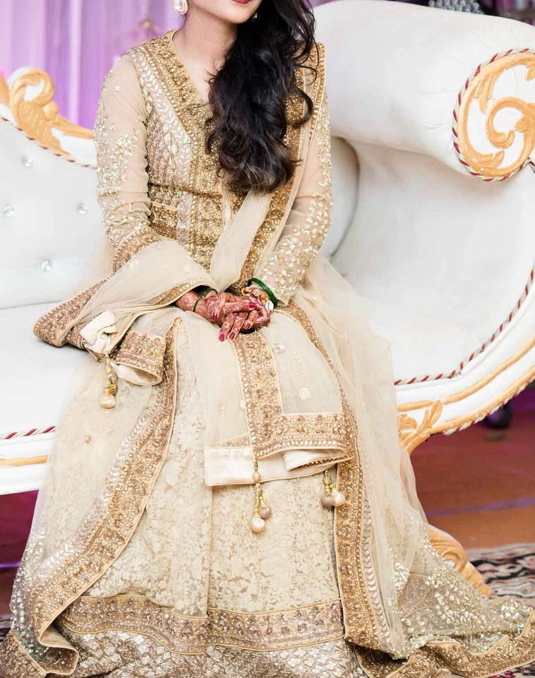A cocktail night stunner- dull gold jacket lehenga