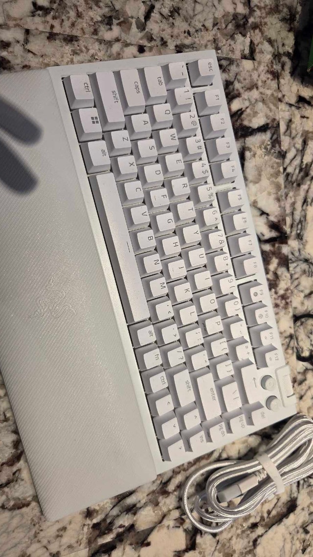 Razer BlackWidow V4 75% Keyboard and Roccat Burst Mouse