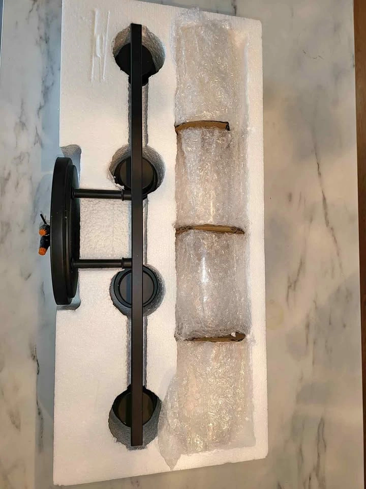 4-light Matte Black Seeded Hammered Glass Vanity Light