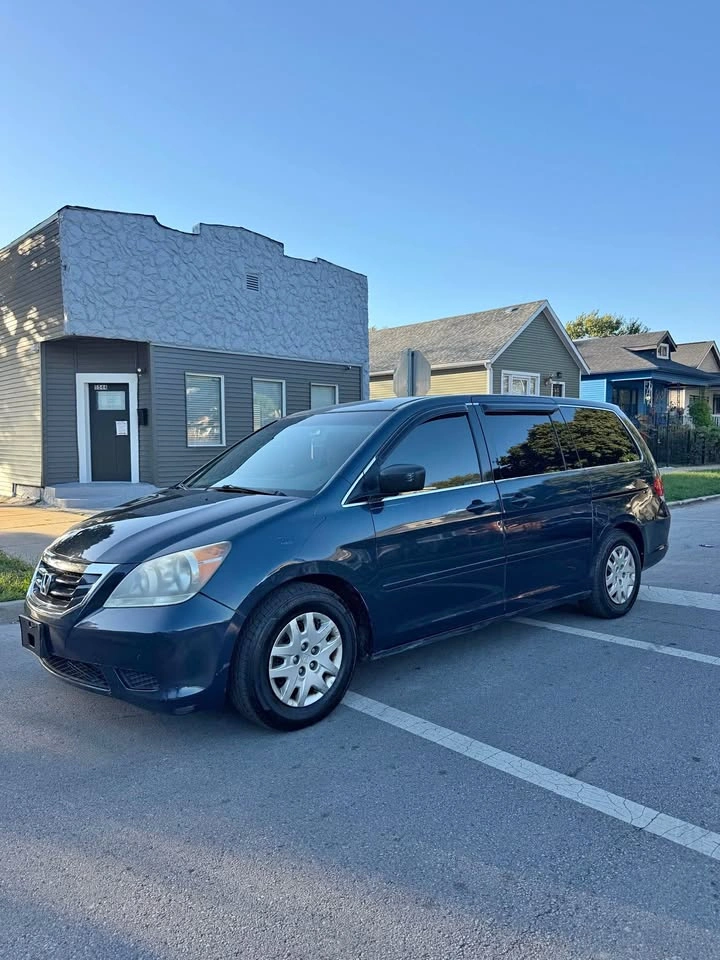 2010 Honda Odyssey · Touring Minivan 4D