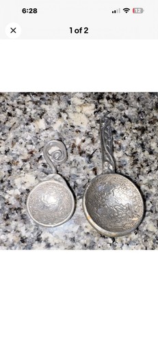 Vintage ornate metal spoons, decorative serving spoons