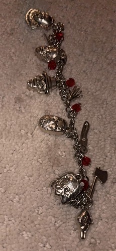 Silver Horror Charm Bracelet with Red Accents and Dangle Charms