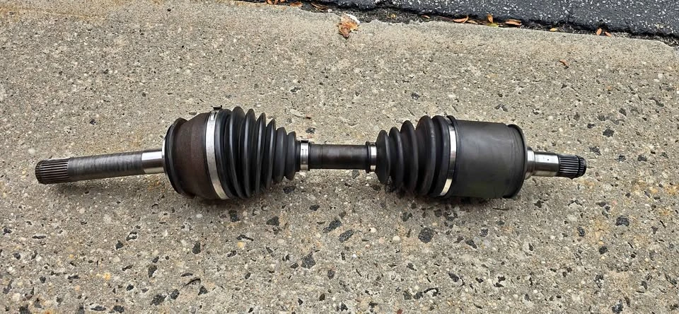 OEM Toyota Landcruiser Passenger side axle- Used Good Condition