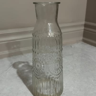 Clear Embossed Glass Carafe Bottle with Floral Pattern