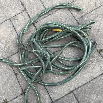 Green Garden Hose – Rubber w/ Metal Fittings