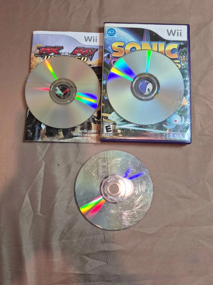 Nintendo Wii 3-Game Lot - Mario Kart Wii, Sonic Colors CIB, MX v - photo 2