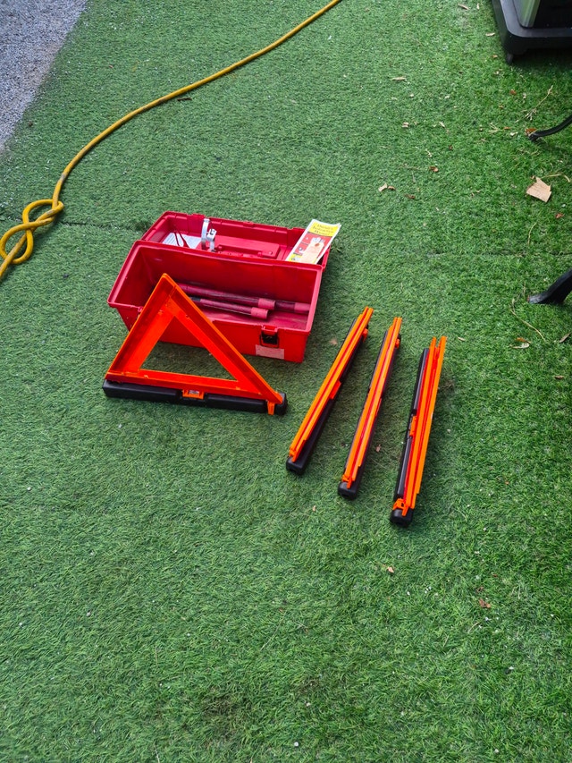 Roadside triangle safety markers, flare and fire extinguisher