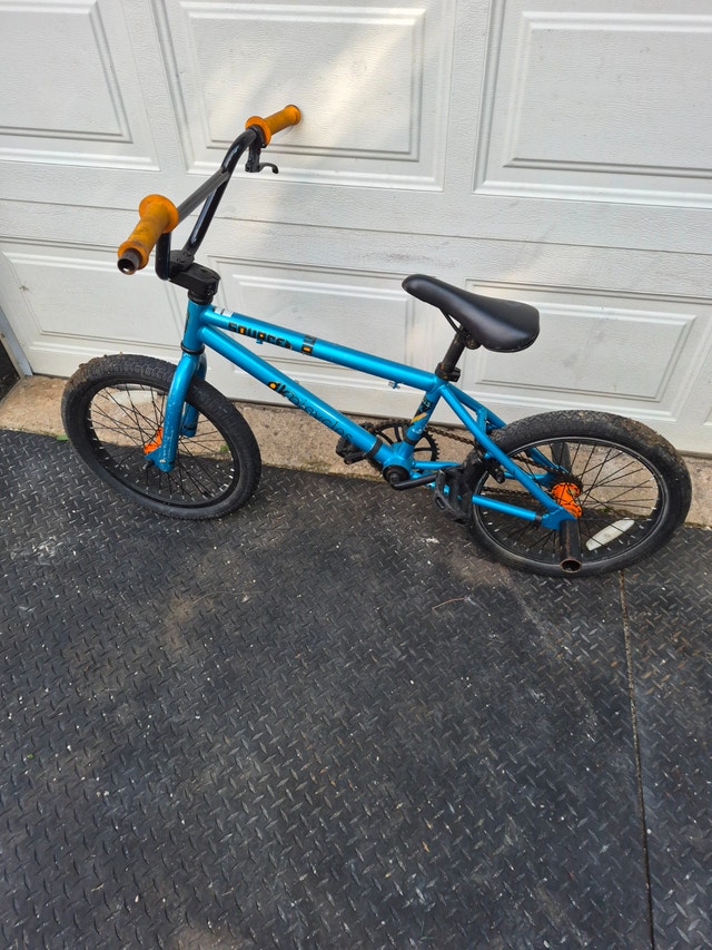 DK source BMX bike blue bicycle