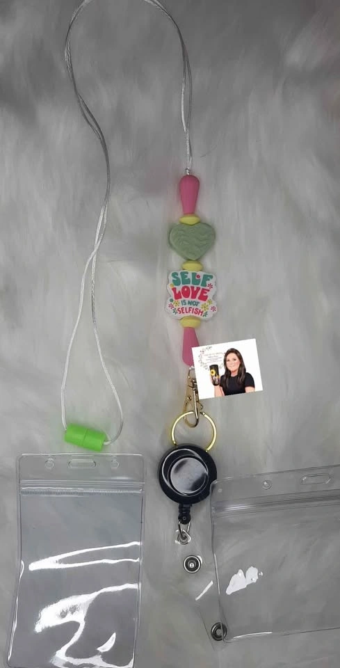 Lanyards with badge reels and clear I.D. card holders