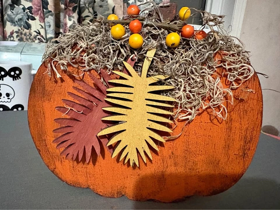 Two wooden pumpkin decors