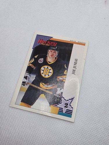 1993-94 Panini Stickers #143 Joe Juneau - photo 2