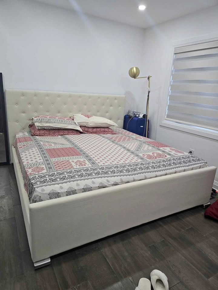 White king size bed in good condition - just the bed frame