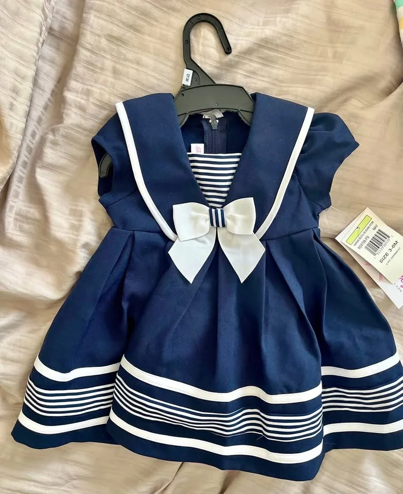 Brand new Baby girl dress size 3-6 months