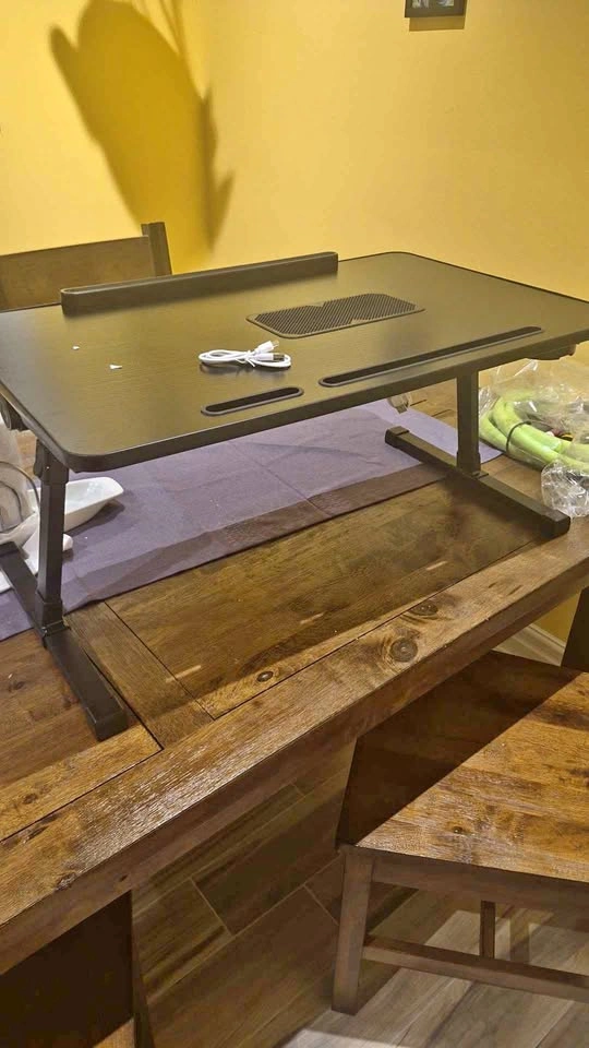 Adjustable laptop table with fan