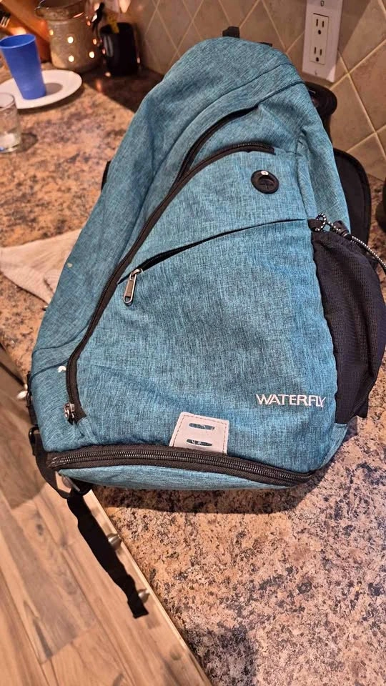 Sling backpack