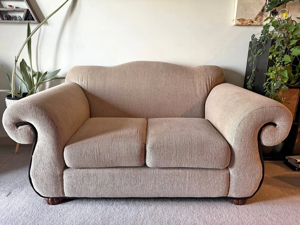 Cream love seat