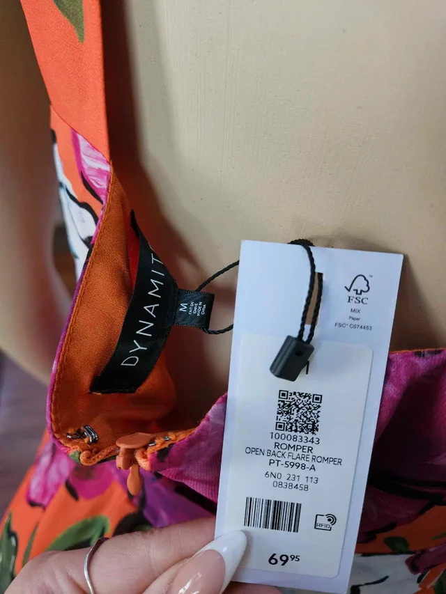 Floral Orange Shorts Romper from Dynamite image indicator(2)