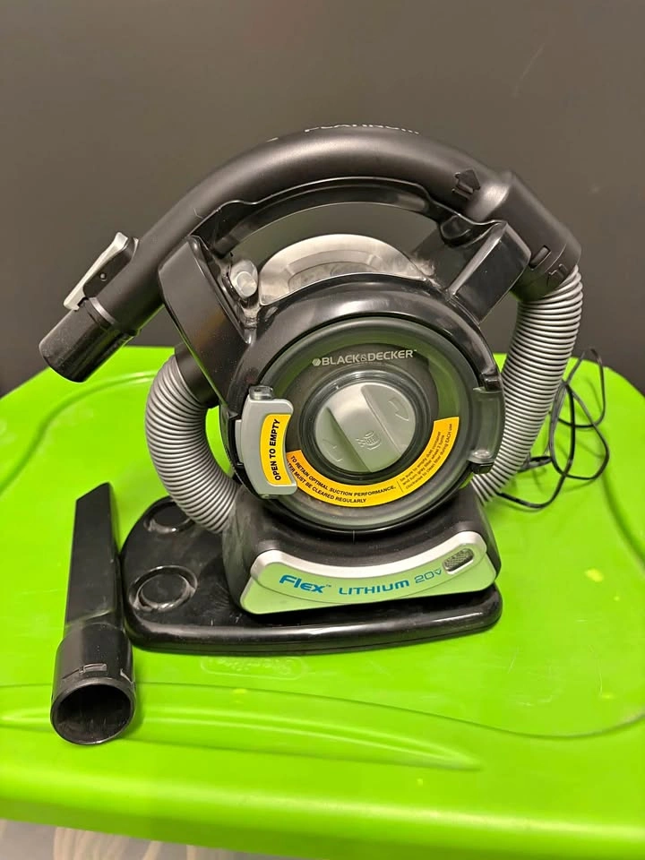 Portable compact vehicle vacuum