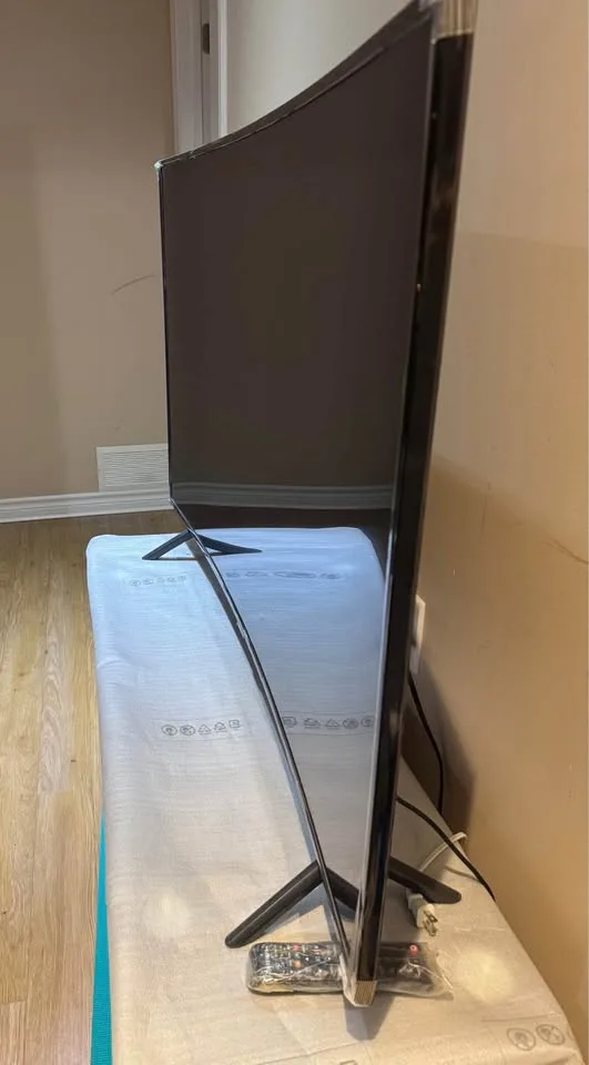 Samsung 55 Curved 4K UHD Smart TV with stand image indicator(5)