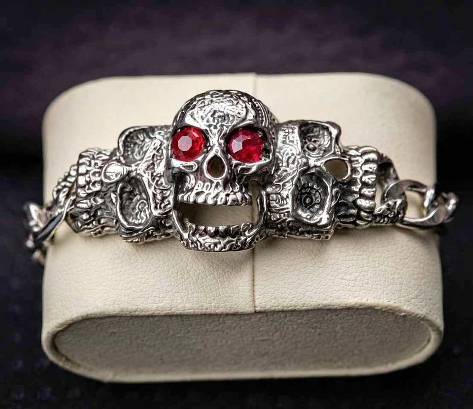 Gothic-style men's skull bracelet with red crystal eyes