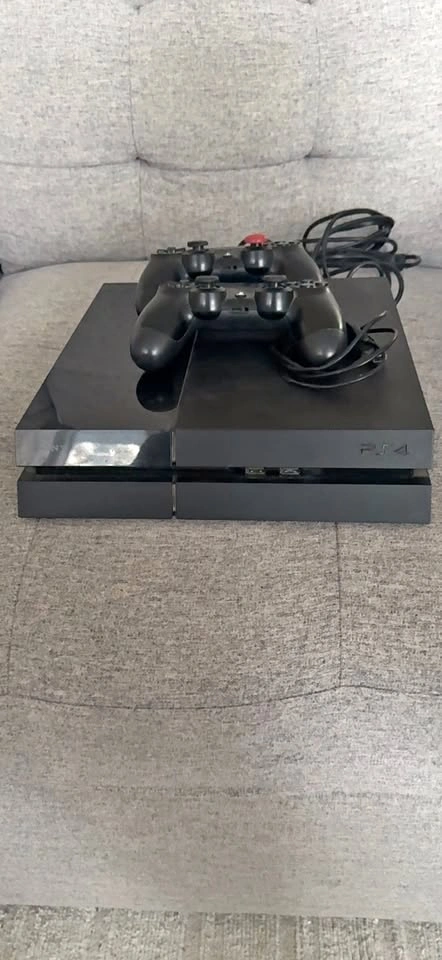 PlayStation 4 Console with 2 Controllers