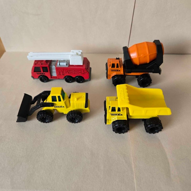 4 Mini Tonka Trucks