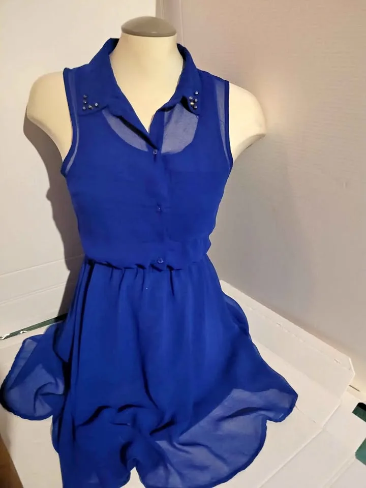 Elegant blue rockin-sheer dress with metal embellishments thumbnail