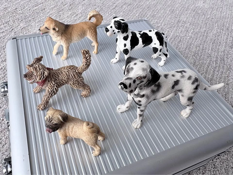 Schleich Collectible Toy Dog Figures. $8 each. Rosenthal