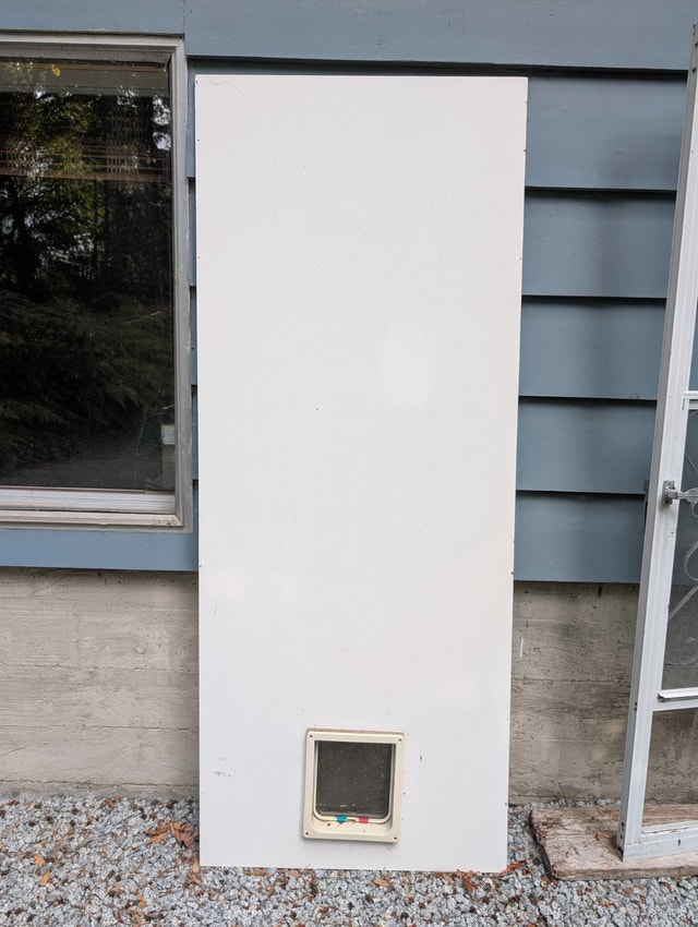 32" 78" Interior Door Panel with a Doggy Door Opening