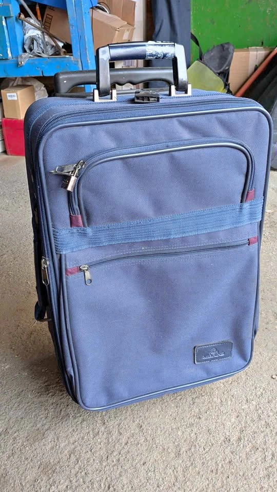 Merino Blue Rolling Suitcase