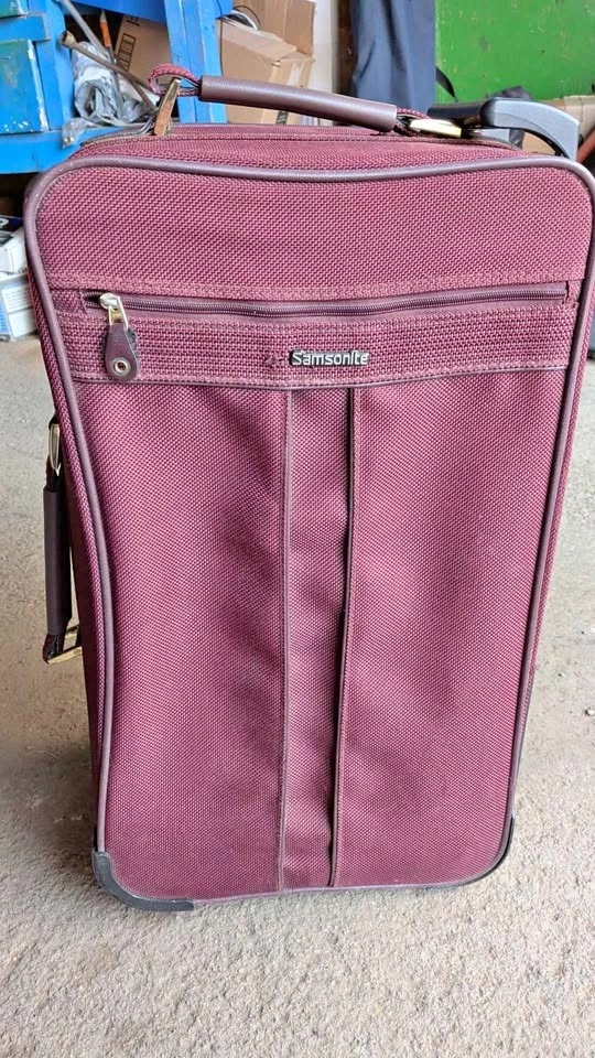 Samsonite Burgundy Softshell Rolling Suitcase