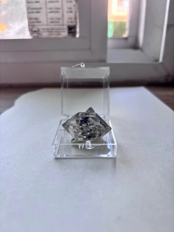 Double-Terminated Quartz Crystal with Anthraxolite Inclusion