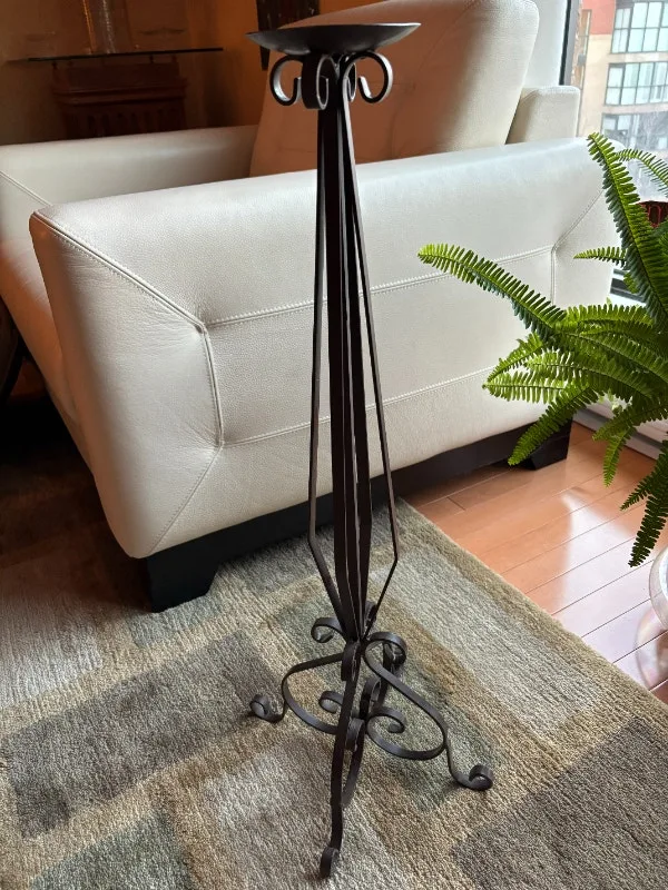 Ornate metal candle holder stand