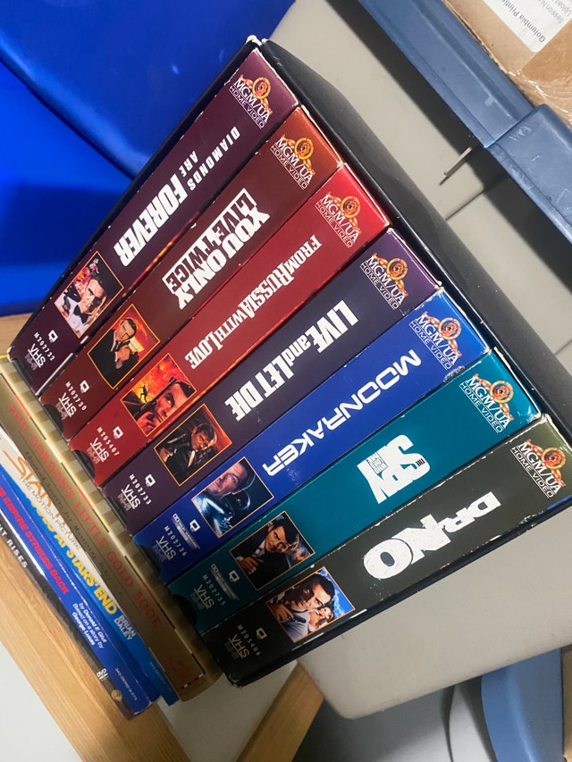 James Bond VHS Collection and Assorted Books - photo 2